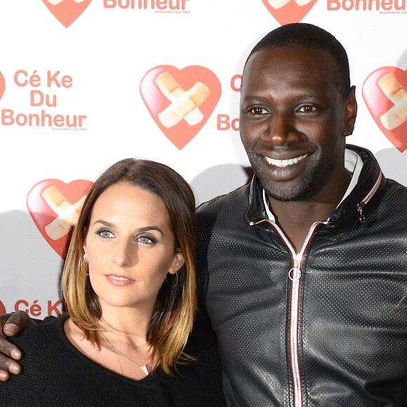 Omar Sy et sa femme Hélène - Avant-Première du film "Samba" au Gaumont Champs-Elysées Marignan à Paris pour l'association "Cé Ke du Bonheur" à Paris le 14 octobre 2014.