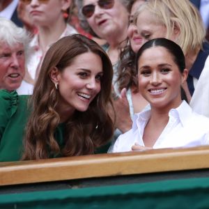 Catherine (Kate) Middleton, duchesse de Cambridge, Meghan Markle, duchesse de Sussex, et Pippa Middleton dans les tribunes lors de la finale femme de Wimbledon "Serena Williams - Simona Halep (2/6 - 2/6) à Londres, le 13 juillet 2019.