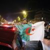 Les Algériens célèbrent la victoire de l'Algérie contre le Sénégal lors de la finale de la Coupe d'Afrique des nations de football 2019 sur l'Avenue des Champs-Elysées à Paris, le 19 juillet 2019. © Stephen Caillet / Panoramic / Bestimage