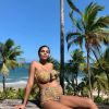 Tina Kunakey enceinte, en maillot de bain lors de vacances au Brésil. Instagram, le 10 janvier 2019.