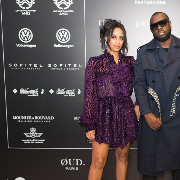 Le rappeur Gims (Maître Gims - Gandhi Djuna) et sa femme Demdem Djuna lors du photocall de la 14ème édition du Casa Fashion Show au Sofitel Casablanca Tour Blanche à Casablanca, Maroc, le 20 avril 2019. Sept ans déjà que le Casa Fashion Show promeut la femme marocaine citoyenne du monde. Devenu un rendez-vous incontournable et placé sous le Haut Patronage de Sa Majesté le Roi du Maroc, l'événement porté par K.Cheddadi et chorégraphié par H.Ghorab, se veut le reflet d'une société plurielle et avant-gardiste, jonglant avec brio entre ses racines orientales et sa culture occidentale. Une société solidaire également... L'événement soutenant depuis son lancement l'Association des Bonnes Œuvres du Coeur dont l'objectif est de redonner un souffle de vie et d'espoir aux bébés bleus. Le Casa Fashion Show dévoile au public marocain les collections Printemps/Eté 2019 des griffes les plus prestigieuses : de Etro à Oud Paris, en passant par Elisabetta Franchi, Pinko, Dice Kayek, Just Cavalli ou encore Orza Couture... Les créateurs marocains Lina Cahill et Sara Chraibi revisitent la robe du soir, avec cet oeil aiguisé et ce sens pointu du détail qui les caractérisent. Le talentueux couturier tunisien, Ali Karoui (souvent surnommé le nouveau Azzedine Alaia), est présent pour la seconde fois consécutive. Enfin, l'enseigne marocaine de luxe IO sera la chaussure officielle de l'événement et l'Oréal Paris, le partenaire coiffure et make up du show. © Philippe Doignon/Bestimage