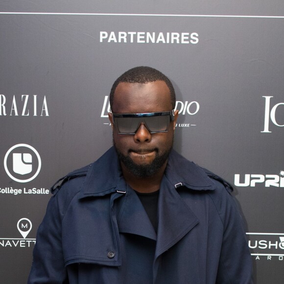 Le rappeur Gims (Maître Gims - Gandhi Djuna) lors du photocall de la 14ème édition du Casa Fashion Show au Sofitel Casablanca Tour Blanche à Casablanca, Maroc, le 20 avril 2019. Sept ans déjà que le Casa Fashion Show promeut la femme marocaine citoyenne du monde. Devenu un rendez-vous incontournable et placé sous le Haut Patronage de Sa Majesté le Roi du Maroc, l'événement porté par K.Cheddadi et chorégraphié par H.Ghorab, se veut le reflet d'une société plurielle et avant-gardiste, jonglant avec brio entre ses racines orientales et sa culture occidentale. Une société solidaire également... L'événement soutenant depuis son lancement l'Association des Bonnes Œuvres du Coeur dont l'objectif est de redonner un souffle de vie et d'espoir aux bébés bleus. Le Casa Fashion Show dévoile au public marocain les collections Printemps/Eté 2019 des griffes les plus prestigieuses : de Etro à Oud Paris, en passant par Elisabetta Franchi, Pinko, Dice Kayek, Just Cavalli ou encore Orza Couture... Les créateurs marocains Lina Cahill et Sara Chraibi revisitent la robe du soir, avec cet oeil aiguisé et ce sens pointu du détail qui les caractérisent. Le talentueux couturier tunisien, Ali Karoui (souvent surnommé le nouveau Azzedine Alaia), est présent pour la seconde fois consécutive. Enfin, l'enseigne marocaine de luxe IO sera la chaussure officielle de l'événement et l'Oréal Paris, le partenaire coiffure et make up du show. © Philippe Doignon/Bestimage