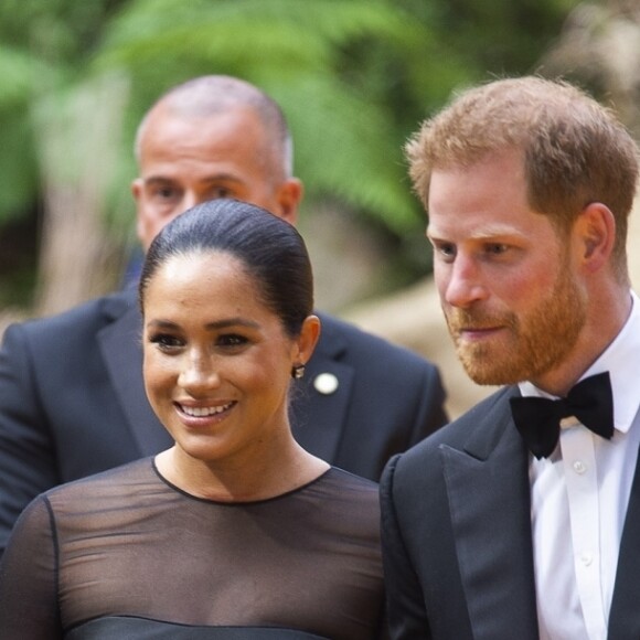 Le prince Harry, duc de Sussex, et Meghan Markle, duchesse de Sussex, à la première du film "Le Roi Lion" au cinéma Odeon Luxe Leicester Square à Londres, le 14 juillet 2019.