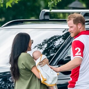 Le prince Harry, duc de Sussex, Meghan Markle, duchesse de Sussex et leur fils Archie Harrison Mountbatten-Windsor lors d'un match de polo de bienfaisance King Power Royal Charity Polo Day à Wokinghan, comté de Berkshire, Royaume Uni, le 10 juillet 2019.