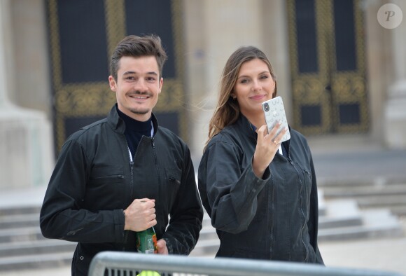 Camille Cerf (Miss France 2015) et son compagnon Cyrille participent à l'animation "Smash Perrier" dans la cadre des Internationaux de France de Roland-Garros 2019, à Paris, France, le 29 mai 2019. En lien avec le tournoi de Roland Garros, Perrier installe une tyrolienne sur la Tour Eiffel du 5 au 11 juin. Le Smash Perrier, c'est s'élancer depuis le deuxième étage de la Tour Eiffel et atterrir à Ecole Militaire une minute plus tard, en tyrolienne ! Comme un smash au tennis en somme, avec une vitesse moyenne de 90 km/h. © Veeren/Bestimage