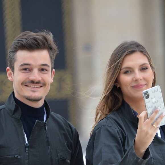 Camille Cerf (Miss France 2015) et son compagnon Cyrille participent à l'animation "Smash Perrier" dans la cadre des Internationaux de France de Roland-Garros 2019, à Paris, France, le 29 mai 2019. En lien avec le tournoi de Roland Garros, Perrier installe une tyrolienne sur la Tour Eiffel du 5 au 11 juin. Le Smash Perrier, c'est s'élancer depuis le deuxième étage de la Tour Eiffel et atterrir à Ecole Militaire une minute plus tard, en tyrolienne ! Comme un smash au tennis en somme, avec une vitesse moyenne de 90 km/h. © Veeren/Bestimage