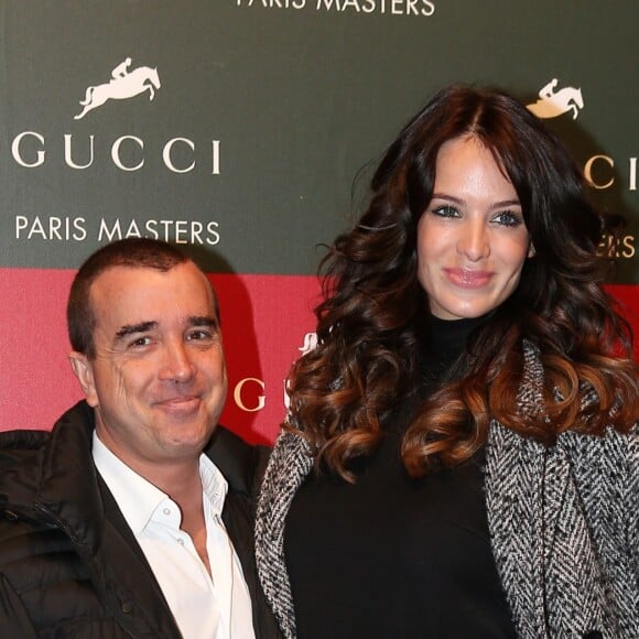 Arnaud Lagardere et Jade Foret - Remise des prix du Gucci Paris Masters 2012 remporte par Marc Houtzager devant Denis Lynch et Alvaro de Miranda a Villepinte le 2 Decembre 2012.
