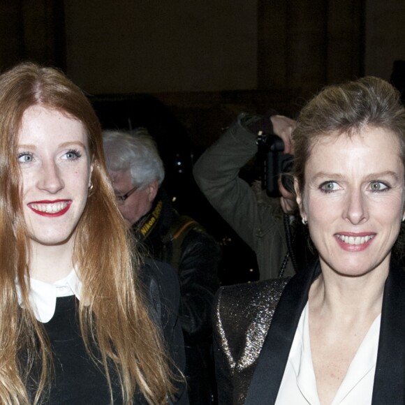 Karin Viard et sa fille aînée Marguerite - Arrivées au défilé de mode Lanvin prêt-à-porter collection Automne/Hiver 2014-2015 lors de la fashion week à Paris le 27 février 2014.