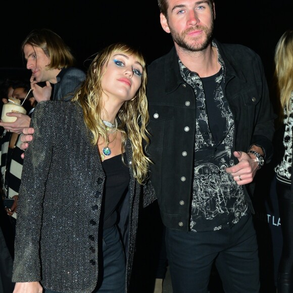Miley Cyrus et son mari Liam Hemsworth ont été aperçus à la sortie du défilé Saint Laurent à Malibu, le 6 juin 2019.