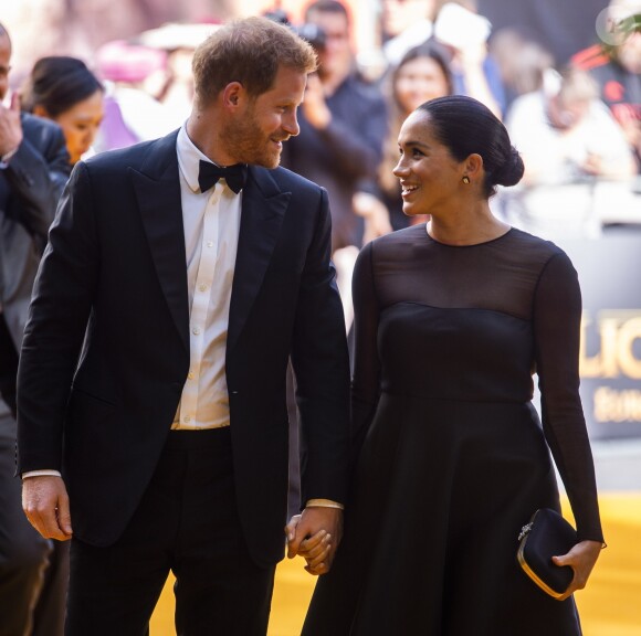Le prince Harry, duc de Sussex, et Meghan Markle, duchesse de Sussex, à la première du film "Le Roi Lion" au cinéma Odeon Luxe Leicester Square à Londres, le 14 juillet 2019.