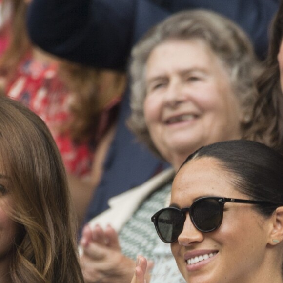 Catherine (Kate) Middleton, duchesse de Cambridge, Meghan Markle, duchesse de Sussex, et Pippa Middleton dans les tribunes lors de la finale femme de Wimbledon "Serena Williams - Simona Halep (2/6 - 2/6) à Londres, le 13 juillet 2019.