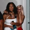 Exclusif - Kylie Jenner et sa meilleure amie (BFF) quittent un club de Miami le 30 septembre 2018. Kylie porte un ensemble rouge vif composé d'un pantalon et d'un bustier en latex