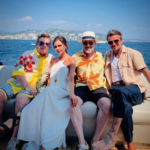 Elton John, Victoria Beckham, David Furnish et David Beckham en bateau en Italie. Août 2019.