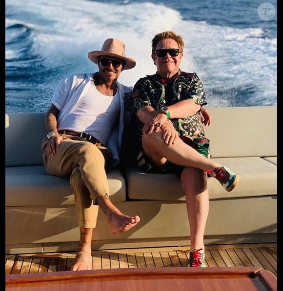 David Beckham et Elton John en vacances en Italie. Août 2019.