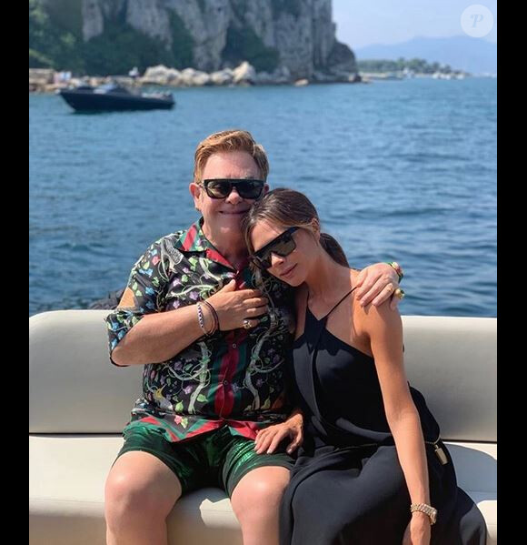 Elton John et Victoria Beckham en vacances en Italie. Août 2019.
