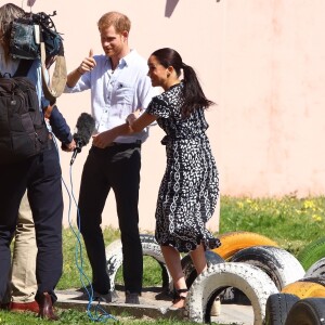 Le prince Harry, duc de Sussex, et Meghan Markle, duchesse de Sussex quittent le township de Nyanga, Afrique du Sud. Le 23 septembre 2019