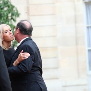 Le président de la République française Emmanuel Macron, sa femme la Première Dame Brigitte Macron et l'ancien Président de la République française François Hollande - Le président de la République française reçoit les chefs d'Etat et de Gouvernement étrangers ayant fait le déplacement en France pour rendre hommage au Président Jacques Chirac au Palais de l'Elysée Paris, France, le 30 septembre 2019. © Cyril Moreau/Bestimage