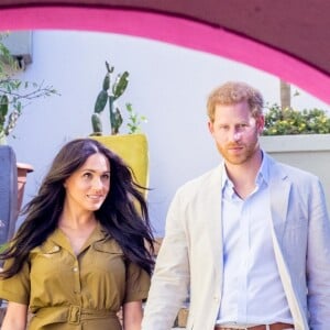 Le prince Harry, duc de Sussex, et Meghan Markle, duchesse de Sussex, lors des célébrations de la fête du patrimoine dans le quartier de Bo Kaap dit "Cape Malay" au Cap, Afrique du Sud, le 24 septembre 2019.