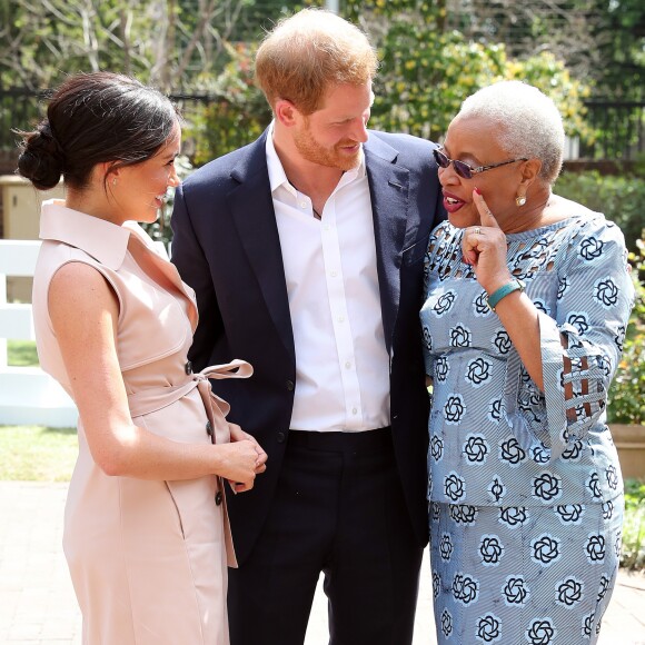 Meghan Markle, duchesse de Sussex, et le prince Harry, duc de Sussex, reçus par Graça Machel, veuve de N.Mandela, à Johannesburg. Le 2 octobre 2019