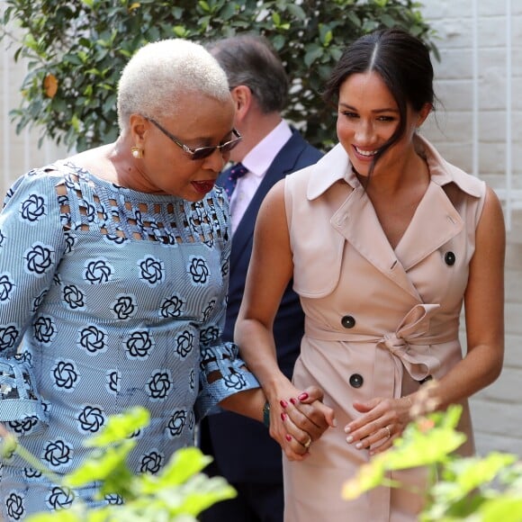 Meghan Markle, duchesse de Sussex, et le prince Harry, duc de Sussex, reçus par Graça Machel, veuve de N.Mandela, à Johannesburg. Le 2 octobre 2019