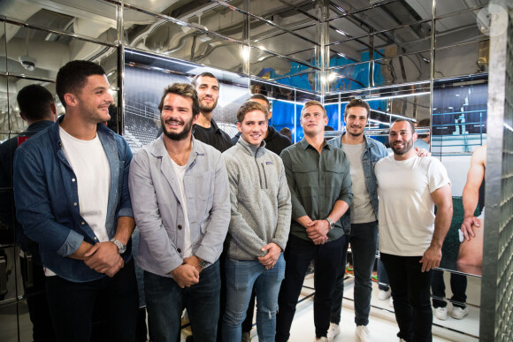 Exclusif - Pierre Fouyssac, Arthur Bonneval, Yoann Maestri, Clément Daguin, Ryan Chapuis, Jules Plisson, Sylvain Nicolas, Jean-Marc Doussain dédicacent le calendrier 2020 des Dieux du Stade aux Galeries Lafayette Champs-Élysées à Paris le 10 octobre 2019.
