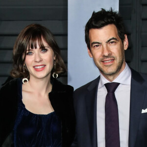 Zooey Deschanel et son mari Jacob Pechenik à la soirée Vanity Fair Oscar au Wallis Annenberg Center à Beverly Hills, le 4 mars 2018.