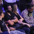 Maxim Nucci (Yodelice) et sa compagne enceinte Isabelle Ithurburu - Maxim Nucci (Yodelice) et sa compagne enceinte Isabelle Ithurburu assistent au match de boxe de Tony Yoka au palais des sports de Paris, le 23 juin 2018 © Veeren-CVS/Bestimage