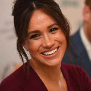 Meghan Markle et le prince Harry participent à une réunion sur l'égalité des genres avec les membres du Queen's Commonwealth Trust (dont elle est vice-présidente) et du sommet One Young World au château de Windsor, le 25 octobre 2019.