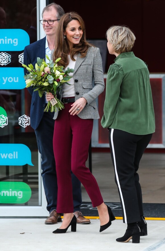 Kate Middleton, duchesse de Cambridge, et son mari le prince William assistent à un évènement caritatif au Troubadour White City Theatre à Londres, le 12 novembre 2019.