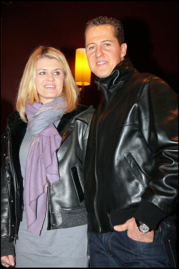 Michael Schumacher et sa femme Corinna- Projection du film "Astérix aux Jeux Olympiques" au profit de l'ICM (Institut du Cerveau et de la Moelle épinière) au cinéma Gaumont Champs-Elysées à Paris, le 13 janvier 2008. 