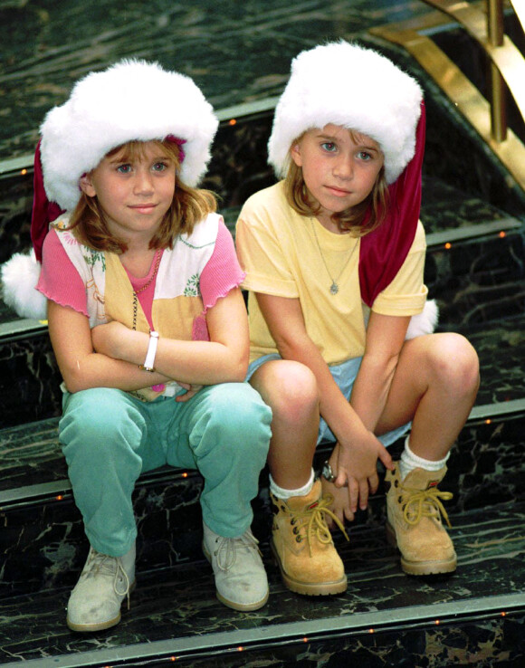 Mary-Kate et Ashley Olsen en croisière à Miami. Le 23 décembre 1994.