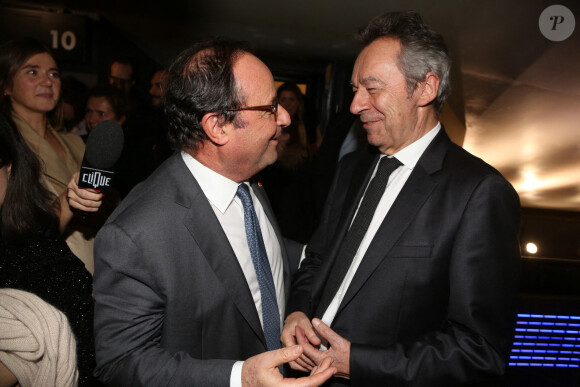 Michel Denisot avec François Hollande lors de l'avant-première du film "Toute ressemblance..." organisée au cinéma UGC Ciné Cité Les Halles à Paris le 25 novembre 2019.