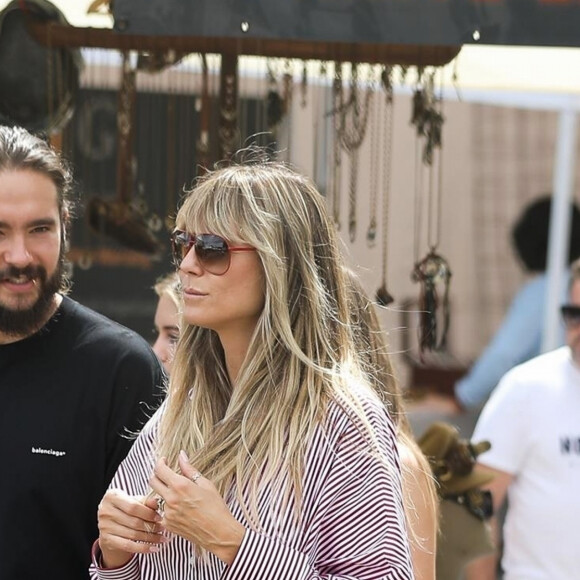 Exclusif - Heidi Klum se promène avec sa fille Helene et son mari Tom Kaulitz au Farmers Market à Los Angeles. La petite famille est arrivée en Bentley orange et a fait du shopping. Le 22 septembre 2019