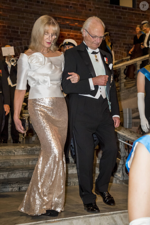 Evy Heldin, le roi Carl XVI Gustav de Suède - Réception de la cérémonie annuelle du Prix Nobel à l'hôtel de ville de Stockholm, le 10 décembre 2019.