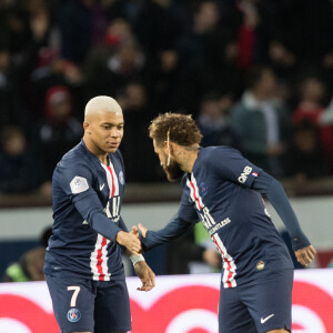 Kylian Mbappé et Neymar lors du match de Ligue 1 Conforama Paris Saint-Germain - Amiens SC au Parc des Princes. Paris, le 21 décembre 2019.