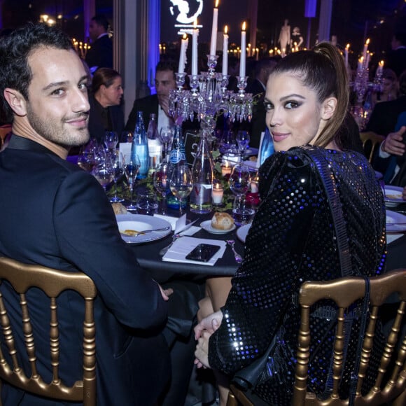 Iris Mittenaere (Miss France et Miss Univers 2016) et Diego El Glaoui - Dîner de gala de l'association AEM (Un Avenir pour les Enfants du Monde) au bénéfice des enfants du Rwanda organisé par B.Djian au Pavillon Ledoyen à Paris, France, le 12 décembre 2019. Chaque année avant les fêtes, B.Djian mobilise la mode, le temps d'un dîner caritatif au profit des enfants du Rwanda. La directrice de la rédaction de Numéro Magazine associe à la cause de l'association AEM, les grandes maisons de couture française. © Olivier Borde/Bestimage