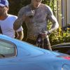 Exclusif - Trace Cyrus (le frère de M. Cyrus), extrêmement tatoué, change plusieurs fois de tenue lors d'un photoshoot dans les rues de Los Angeles, le 20 août 2019.