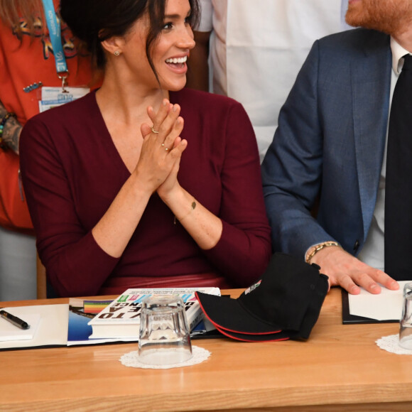 Le prince Harry, duc de Sussex, et Meghan Markle, duchesse de Sussex, participent à une réunion sur l'égalité des genres avec les membres du Queen's Commonwealth Trust (dont elle est vice-présidente) et du sommet One Young World au château de Windsor, le 25 octobre 2019.