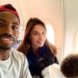 Ariane Brodier, Fulgence et leur fils dans l'avion, direction les Maldives, en novembre 2019