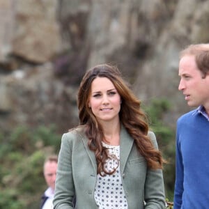 Le prince William et la duchesse de Cambridge, Kate Middleton, assistent au Marathon "The Ring O'Fire " sur l' Ile d'Anglesey en août 2013.