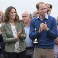 Le prince William et la duchesse de Cambridge, Kate Middleton, assistent au Marathon "The Ring O'Fire " sur l' Ile d'Anglesey en août 2013.
