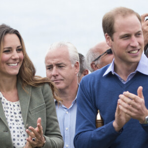 Le prince William et la duchesse de Cambridge, Kate Middleton, assistent au Marathon "The Ring O'Fire " sur l' Ile d'Anglesey en août 2013.