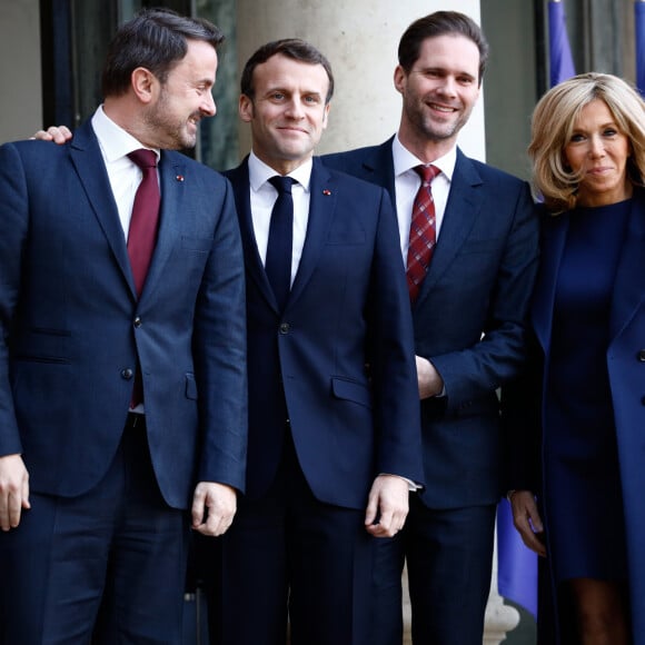 Xavier Bettel, premier ministre du Luxembourg, le président Emmanuel Macron, Gauthier Destenay, mari de Xavier Bettel, la première dame Brigitte Macron - Le président de la République et sa femme accueillent le président du conseil européen et le premier ministre du Luxembourg au palais de l'Elysée à Paris le 10 janvier 2020. © Hamilton / Pool / Bestimage