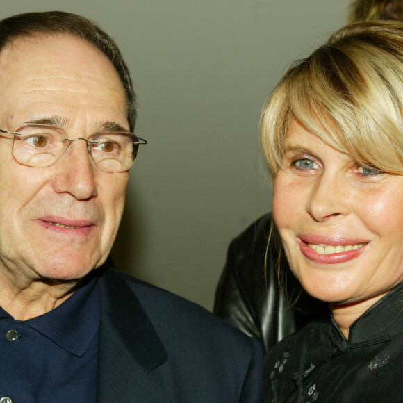 Archives - Robert Hossein et sa femme Candice Patou lors de la première '''Demoiselles de Rochefort'' à Paris, le 2 octobre 2003. © Frédéric Piau/Bestimage02/10/2003 - Paris