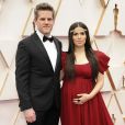 Ryan Piers Williams et sa femme America Ferrera (enceinte) lors du photocall des arrivées de la 92ème cérémonie des Oscars 2019 au Hollywood and Highland à Los Angeles, Californie, Etats-Unis, le 9 février 2020.