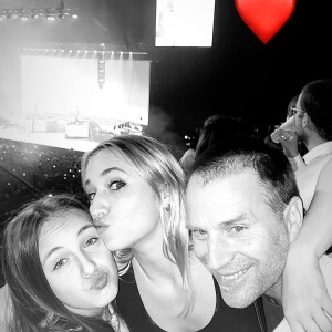 Alexandra Lamy, son ex Thomas Jouannet et leur fille Chloé au concert d'Angèle à Bercy, le 18 février 2020.