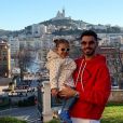 Morgan Sanson, milieu de terrain de l'Olympique de Marseille, posant avec sa fille aînée Julia à Marseille en janvier 2020, avec Notre-Dame de la Garde en toile de fond. Photo Instagram.