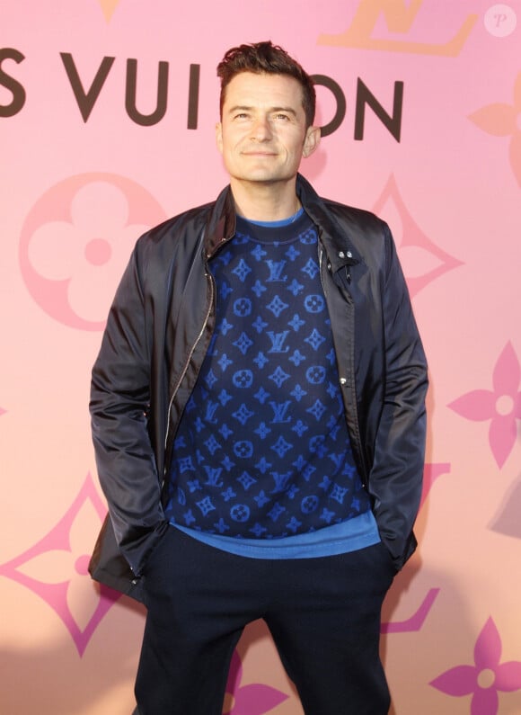 Orlando Bloom au photocall d'une soirée organisée par "Louis Vuitton" à Los Angeles, le 27 juin 2019.