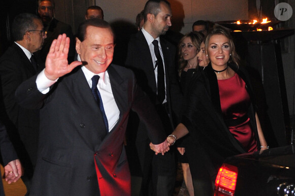 Silvio Berlusconi et sa femme Francesca Pascale - Sortie du mariage de Michelle Hunziker et Tomaso Trussardi à Bergame, le 10 octobre 2014.