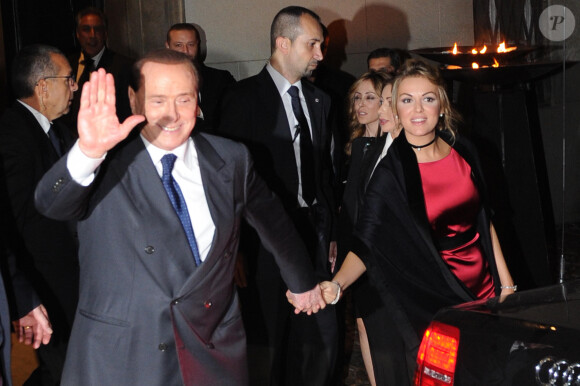 Silvio Berlusconi et sa femme Francesca Pascale - Sortie du mariage de Michelle Hunziker et Tomaso Trussardi à Bergame, le 10 octobre 2014.